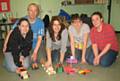 Parents Mandy Rowles, Steven Greenacre, Jo Phillips, Nikki Barker and Stacey Johnson show off their scrapheap challenge Christmas gifts.