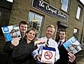 Tommy Downes from Rochdale Borough Council, Councillor Wera Hobhouse, Dave Wolstenholme from the Carpet Studio and Christian Crossley from Groundwork Oldham and Rochdale show their support for the Tidy Business Standards Charter.