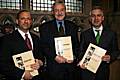 Louis Ferrante, Terry Piggott and Jonathan Douglas commemorate Rochdale's successful participation in the National Year of Reading.