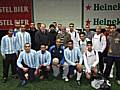 The finalists line up alongside guests of the tournament Simon Danczuk and Councillor Mohammed Sharif (middle) and Azmat Khan, Community Officer at Rochdale Football Club.