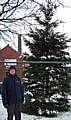 Councillor Peter Davison at the Castleton Christmas tree in the snow earlier this week.