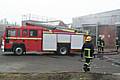 Fire engines outside the old mill building.