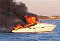 The luxury Sealine F34 vessel engulfed in flame.