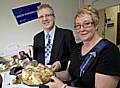 Christine Bussy and Detective Constable Andy O’Donnell enjoy a cake and raise funds for Cancer Research.