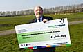 Lord Pendry with the £1 Million cheque presented by the Football Foundation