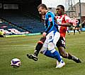 Archibald-Henville hauls down Adam Le Fondre in the box to give Rochdale their penalty.