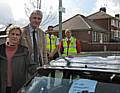 Curbing car sales on Bolton Road: Councillors Wera and William Hobhouse with members of the Council's Parking Services team.