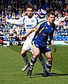 Grant Holt keeps the ball away from Keltie<br />Shrewsbury v Rochdale - Monday 13 April 2009