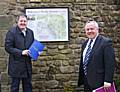 Councillor Dale Mulgrew alongside John Miller – Chief Executive of the Heritage Trust for the North West – outside the Pendle Heritage Centre