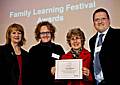 Beverly Hughes MP presents the national accolade to Rachael El Weshahi, Belfield children centre centre leader, Anne Hanley, Senior Probation Officer at HMP Buckley Hall Prison and Stuart Jenkins, Head of Intervention at Buckley Hall Prison.