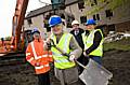 Resident Philomena Renshaw sees the demolition underway, together with Ken Palmer (Palmer Demolition), Steve Hughes, Senior Surveyor, RBH and Linda Byrne from the Kirkholt HMR team.