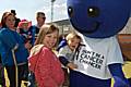 The 'cancer chancer' mascot meets young Rochdale fans during the launch event at Spotland Stadium on Saturday.