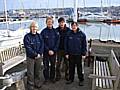 The B2 Class team pictured wearing their Silver Medals, from left to right: Gary Butler, Jackie Veenes, Lucy Hodges (helm) and Adam McGovern.