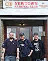 Carl Rigg (left) with his neighbours at the Newtown National Club.