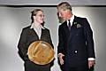 Lisa Daly receives her award from the Prince of Wales.