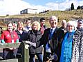 Mayor Robin Parker marks the official opening of the new heritage trail by placing the first way marker.