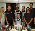 What's cooking? Councillor Farooq Ahmed shows fire officers a thing or two in the kitchen