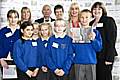 Staff and pupils of St Edwards CE Primary School receiving the DCSF Award for Sustainable Schools