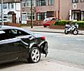 Traffic build up: The motorbike veered into a turning car on Bolton Road