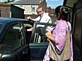 Road Safety Officer, Dave Godley showing one of the Howard Street parents how to fit a car seat.