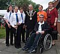 Alan Brooks, the chairman of Rochdale Branch, and Helen Jungmayr join the Mayor and Mayoress at the MS Society's garden party, alongside members of the Rochdale Junior Wind Band.