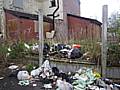 Flytipped rubbish on Sparthbottoms Road.