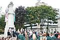 A small crowd and local dignatories gather to commemorate UN Peace Day.