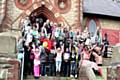 Members of the community celebrating on the steps of St Peter's Church, Newbold