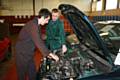 Motor Vehicles students work on a donated car