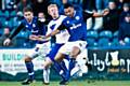 Rochdale 1 - 1 Oldham<br />Marcus Holness wins the ball