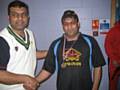 Bari of Baba XI receiving his man of the match award from Iqbal of RYCC.