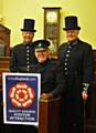 Volunteers from the police museum Tom Hughes, Danny Ewington and Ian Prendergast celebrate after being given the official sign of approval from the Enjoy England tourist board.