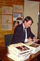 Eric Knowles  signing copies of his book after the talk