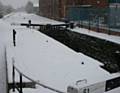 The snow covered Rochdale Canal in Castleton