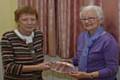 Pat King (left) awards Rochdale Artists' Founders Plate to Gay Wilshire
