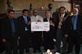 Handing over the cheque - Master Mohammed Rafiq, Khizer Mohammed, Bostan Ali, Beryl Stratham, Mayor of Rochdale Cllr Zulfiqar Ali, Mohammed Rashid
