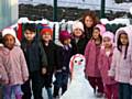 Children with their snow-lady!