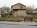 The green area at the corner of Railway Street and Huddersfield Road, Newhey 