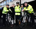 Councillors Mohammad Sharif and Dale Mulgrew with  officers on the new push bikes