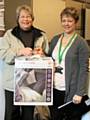 Janet Whittles from Bamford gets her free replacement blanket from Joanne Redford at the safety event