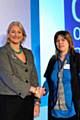 Nicky MacGill receives her award from Zenna Atkins, Chairwoman of the Ofsted board