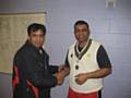 Iqbal of RYCC receiving man of the match award from M Siddique (one of the organisers of RPCL)