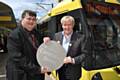 William Roache (right) who plays Ken Barlow in ITV's Coronation Street, and Cllr Keith Whitmore, Chair of GMITA (left) with a new M5000 Metrolink tram featuring a commemorative Coronation Street plaque