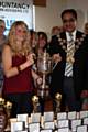 First team captain, Claire Pearson holds the Northern Combination League Cup, alongside the Mayor of Rochdale, Councillor Zulfiqar Ali