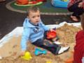 A child playing at the beach party