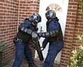 Police raid a house in Rochdale