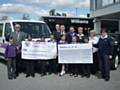 Left to right: Nigel Ashton,children from Lever Hulme School Bolton, Derek Jones,
Lee Potter, staff from Williams Rochdale and 
Jean Spencer Animal Centre Manager from Rochdale RSPCA.

