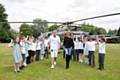 Phil and Julie Neville with pupils from one of the schools they visited