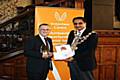 Michael Badham collects his award from the Mayor of Rochdale, Councillor Zulfiqar Ali