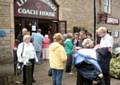 A tour party leaving The Coach House